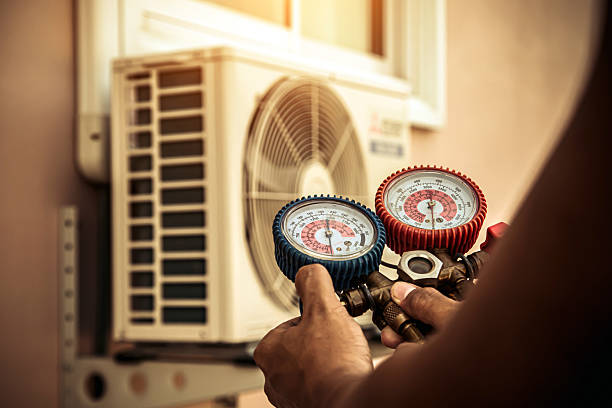 Professional Heat Pump Repair technician working in Nashville, MI